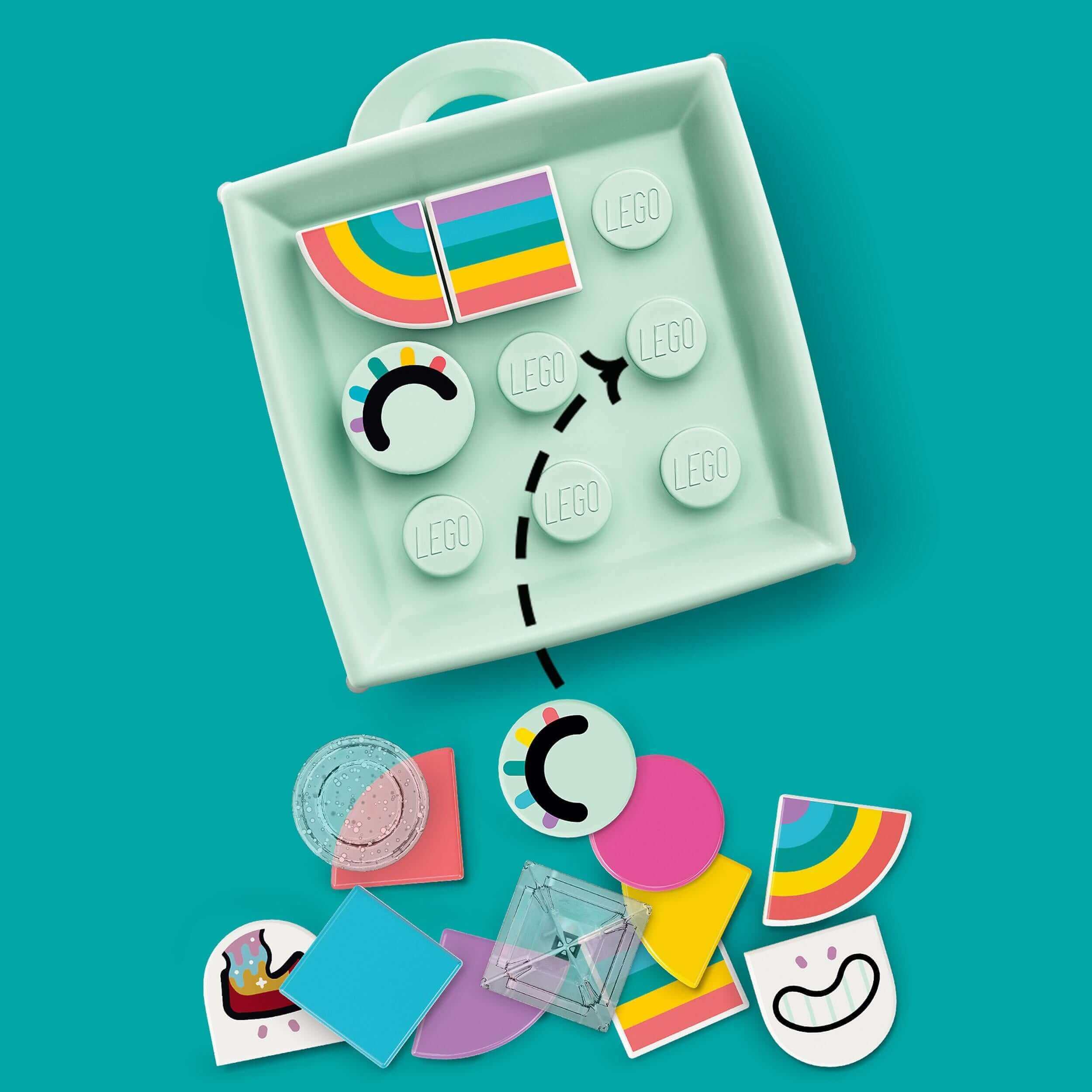 LEGO® DOTS Bag Tag Unicorn arts and crafts set with colorful design tiles in a mint bowl, perfect for creative play.