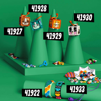 Colorful LEGO® DOTS bracelets and tiles displayed on green geometric stands, showcasing products 41922, 41927, 41928, 41929, 41930, 41933.