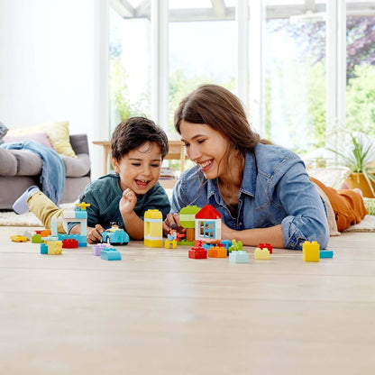 Mother and child enjoying creative play with LEGO® DUPLO Classic Brick Box Set 10913, enhancing developmental skills.