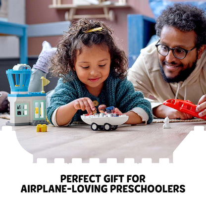 Child playing with LEGO® DUPLO aeroplane set with adult, highlighting fun gift for preschoolers.