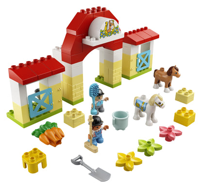 LEGO DUPLO Town Horse Stable set with ponies, caretakers, and accessories for imaginative toddler play.