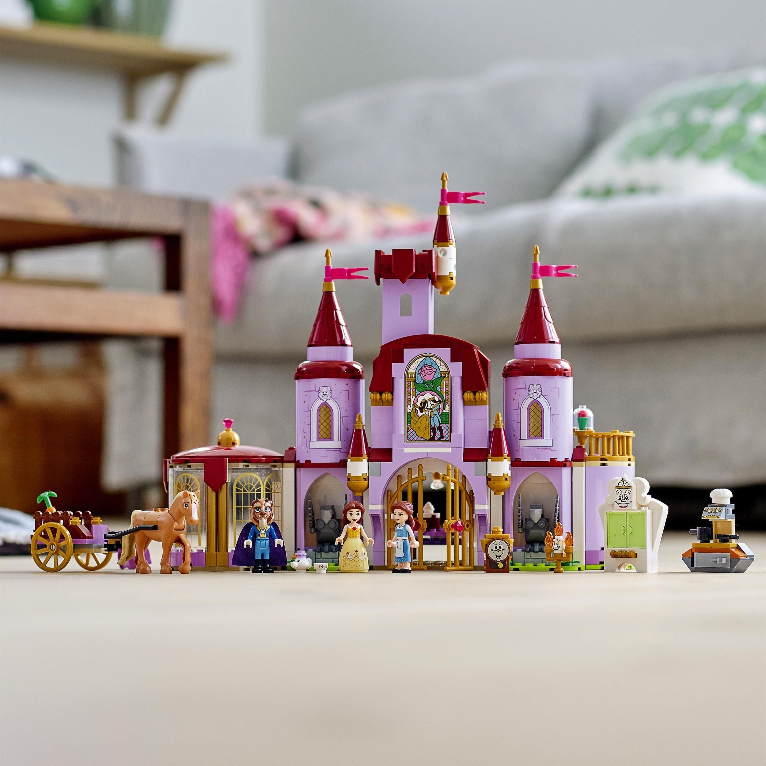 LEGO Disney Belle and the Beast's Castle Set 43196 with 3 mini dolls and 7 figures in a colorful design.