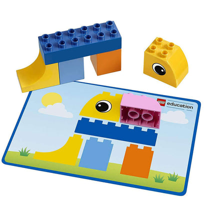 LEGO Education Animal Bingo 45009 pieces with colorful building blocks on an illustrated play mat.
