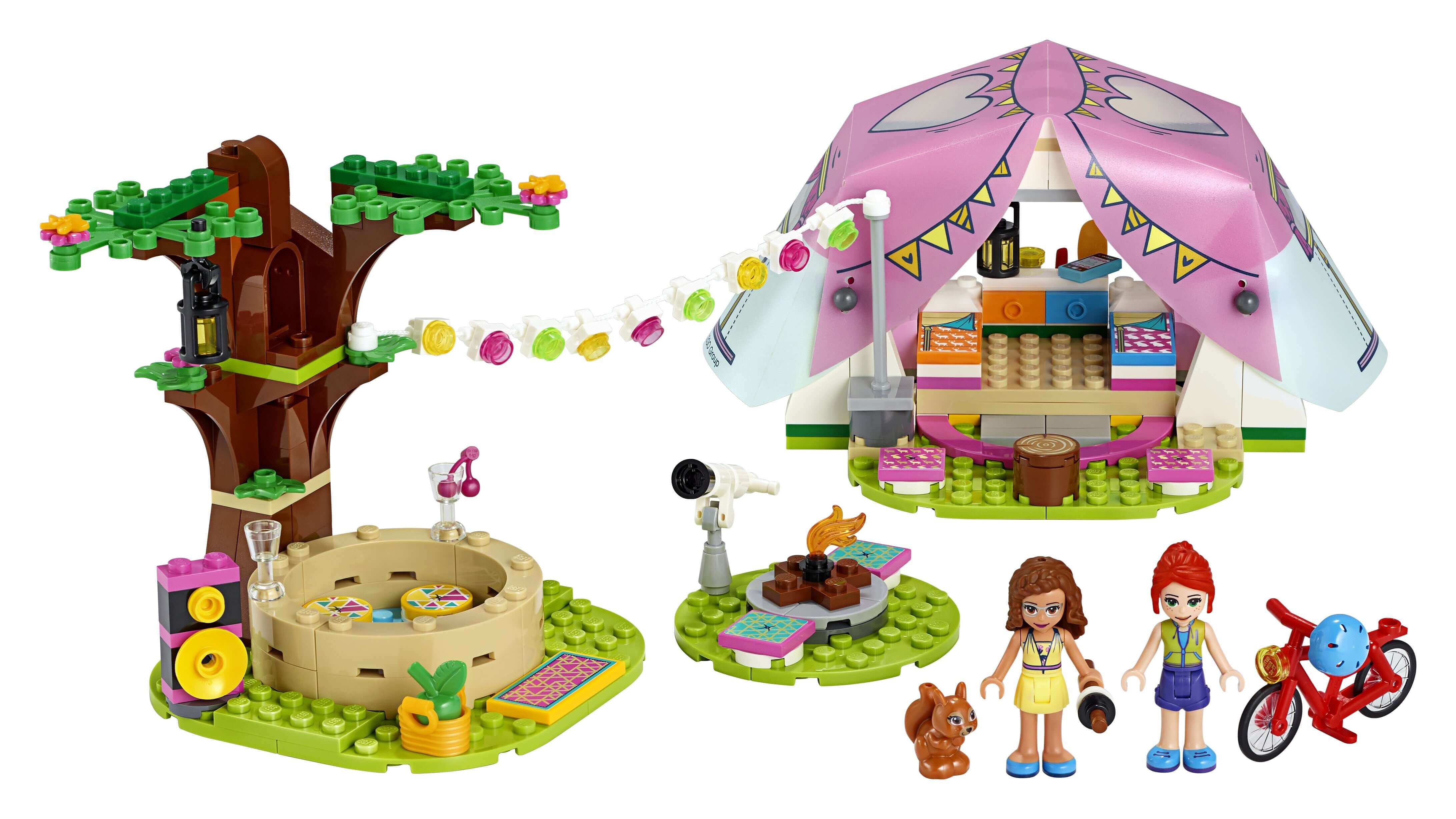 LEGO® Friends Nature Glamping Set 41392 with tent, tree, and friends exploring nature outdoors in style.