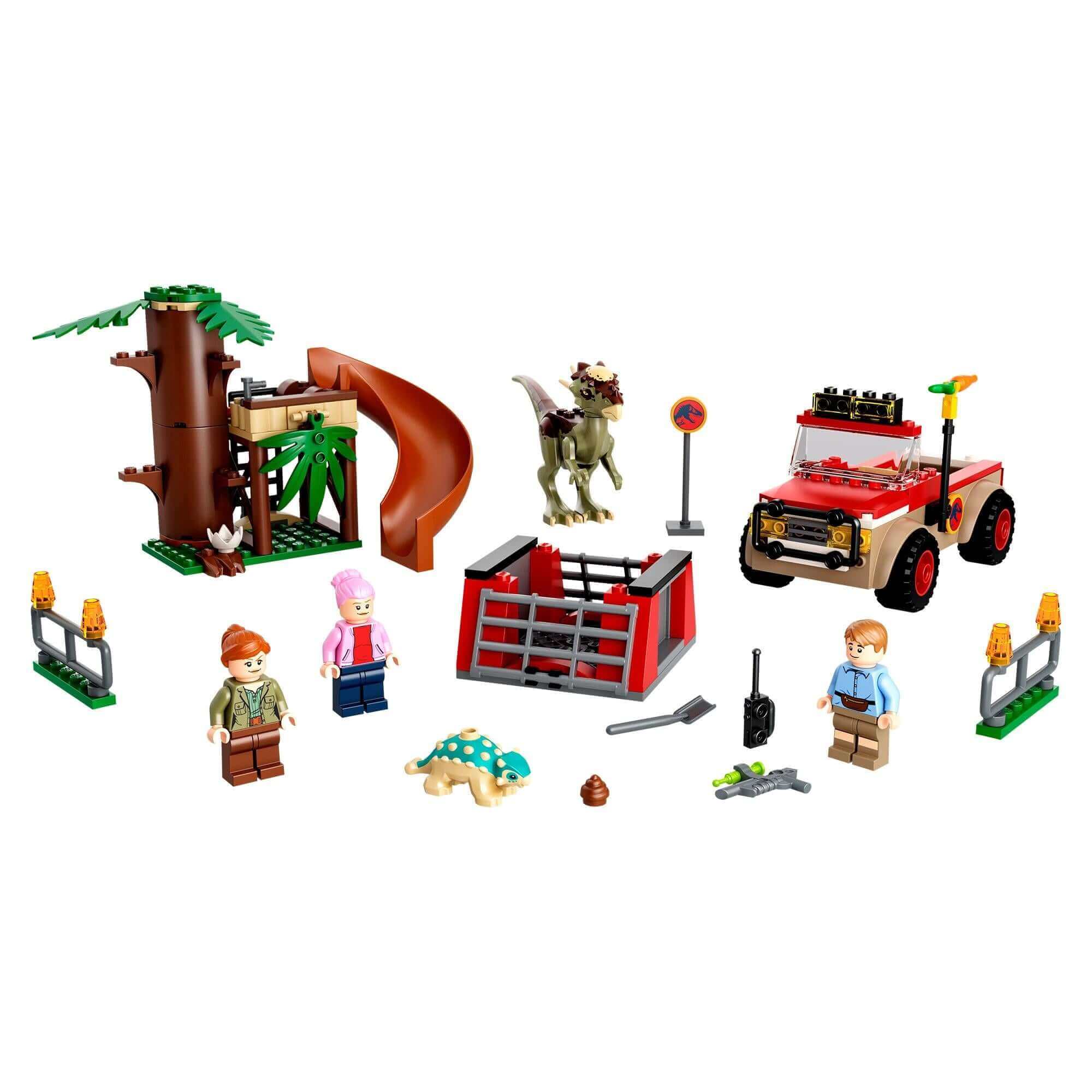 LEGO® Jurassic World Dinosaur Escape set 76939 featuring Stygimoloch, off-roader, tree house, and minifigures.