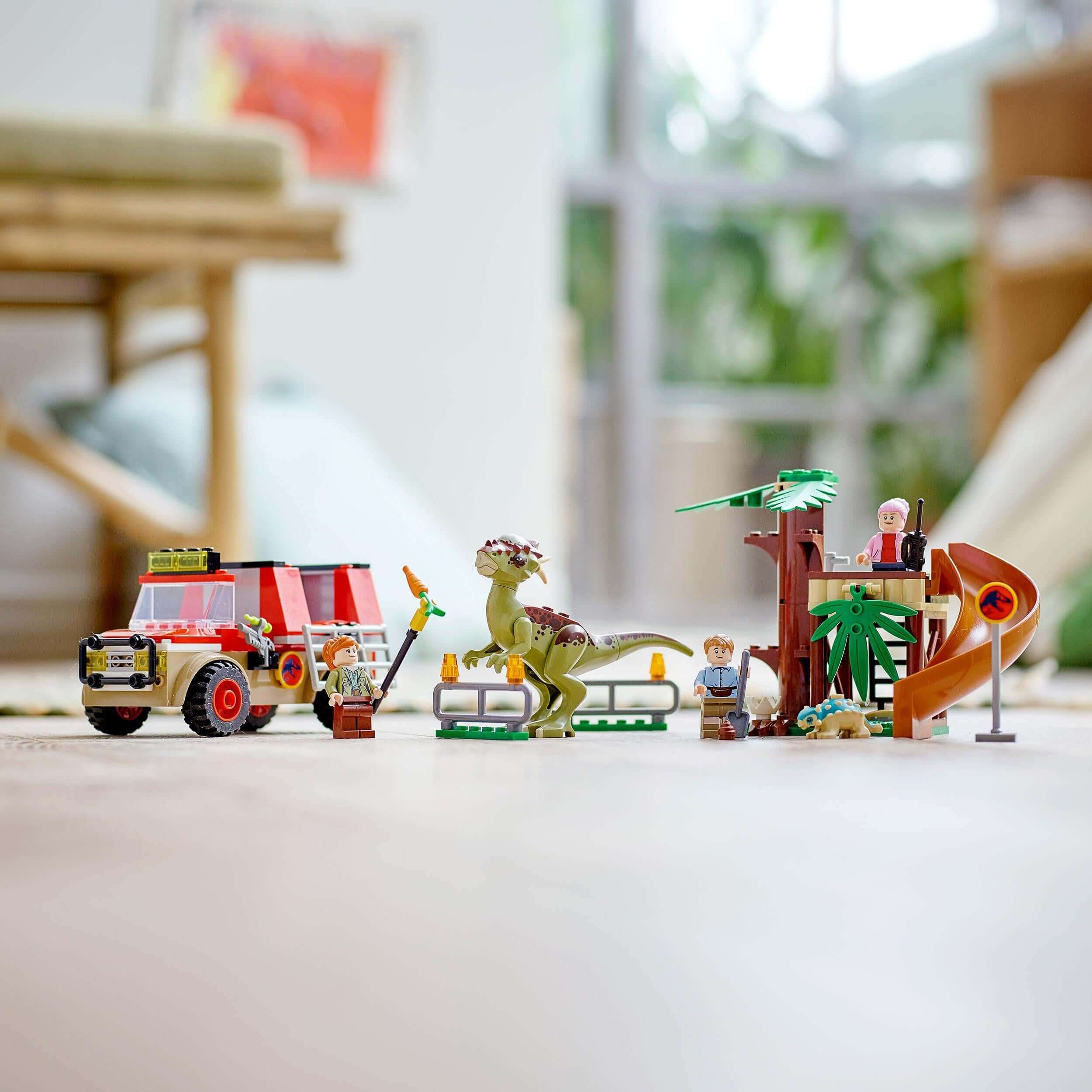 LEGO® Jurassic World Dinosaur Escape Toy 76939 featuring Stygimoloch, off-roader, and tree house for imaginative play.