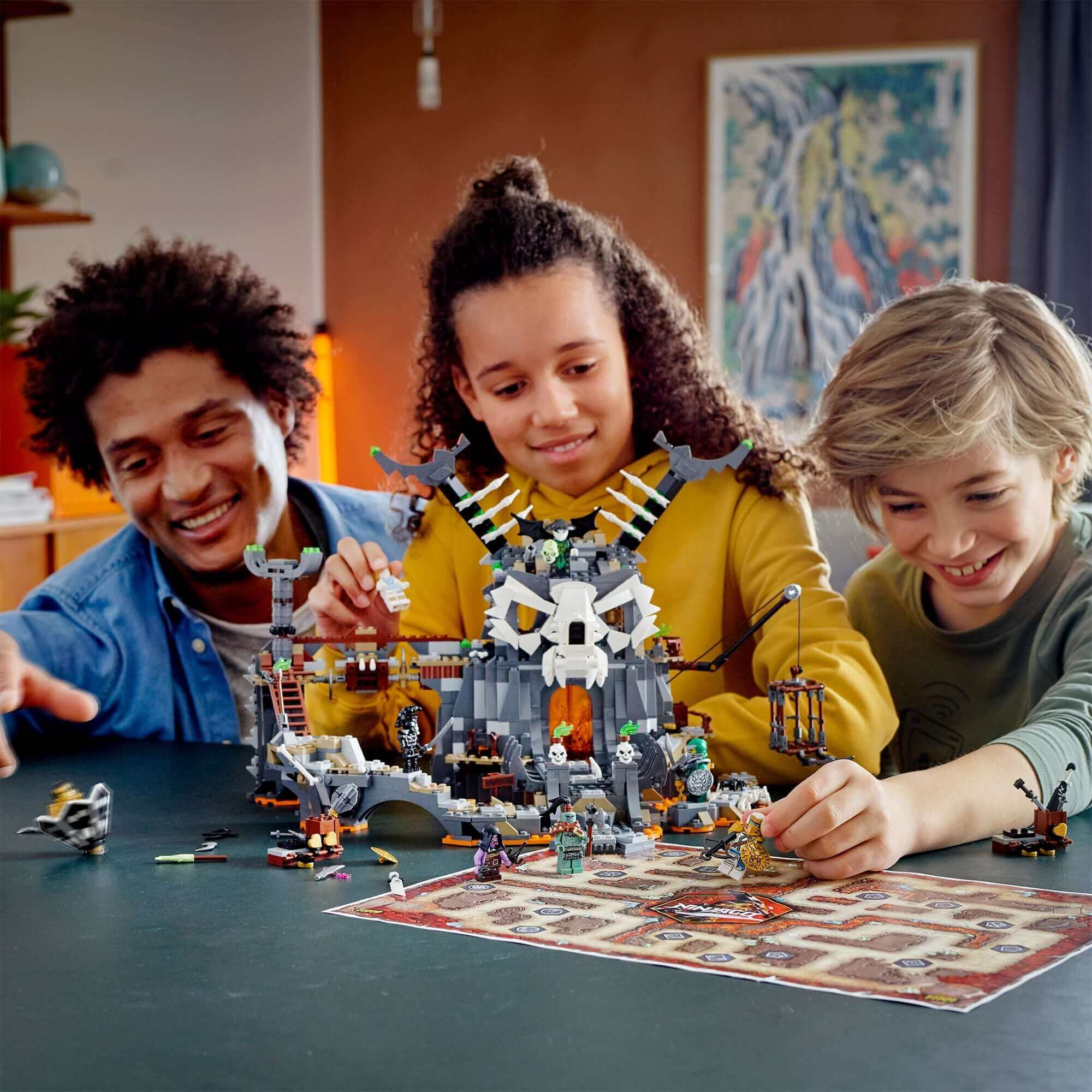Kids enjoying the LEGO® NINJAGO Skull Sorcerer's Dungeons 2in1 Set 71722, filled with interactive adventures.