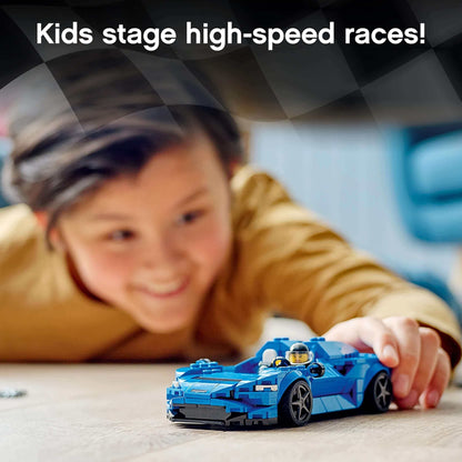 Child enjoys playing with LEGO® Speed Champions McLaren Elva race car, staging high-speed races.
