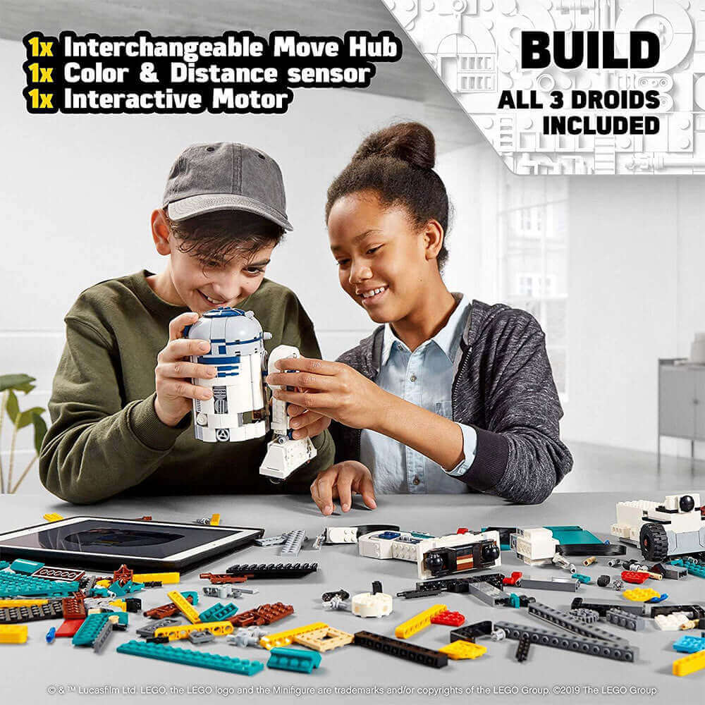 Kids building LEGO Star Wars BOOST Droid Commander with R2-D2, showcasing interactive elements and fun coding play.