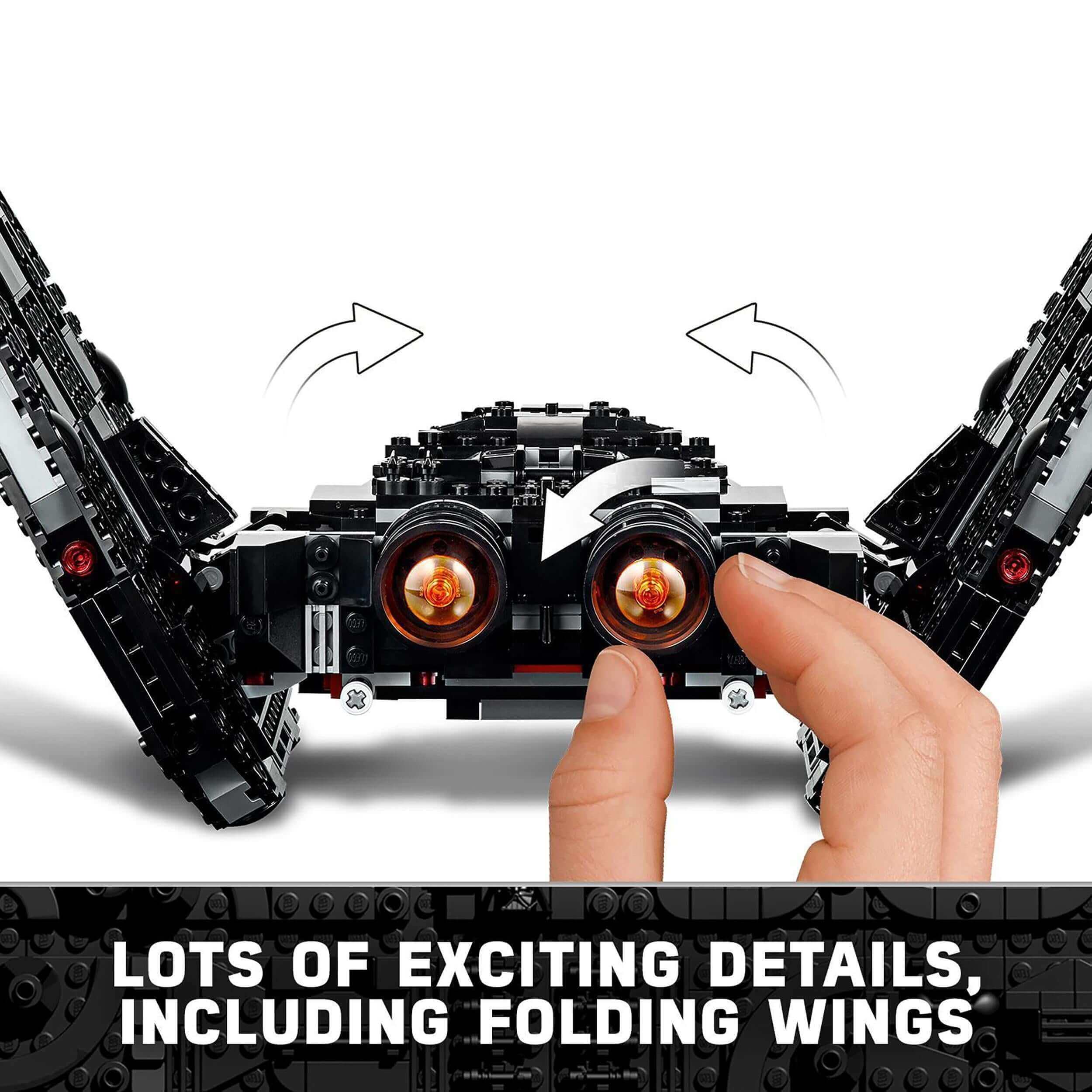 Close-up of LEGO Kylo Ren's Shuttle with fingers showing foldable wings and detailed design from Star Wars set 75256.