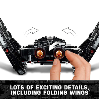 Close-up of LEGO Kylo Ren's Shuttle with fingers showing foldable wings and detailed design from Star Wars set 75256.