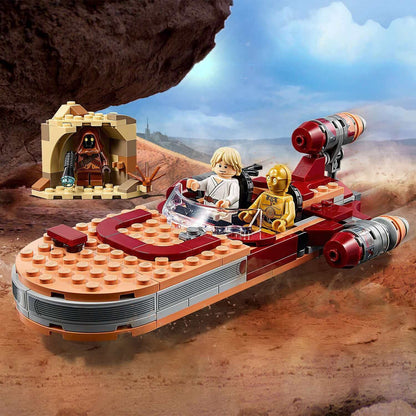 LEGO Star Wars Luke Skywalker Landspeeder 75271 with C-3PO, speeding across Tatooine desert.