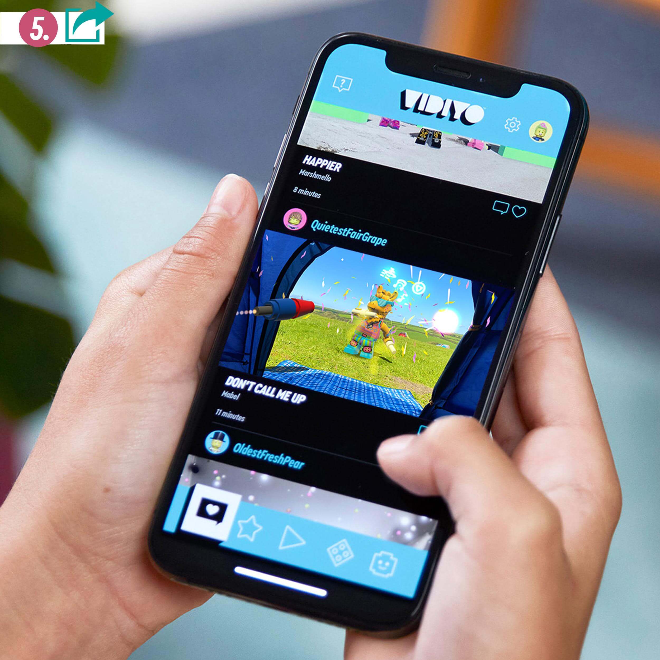 Child interacting with the LEGO® VIDIYO™ app on a smartphone, creating music videos featuring Party Llama BeatBox.
