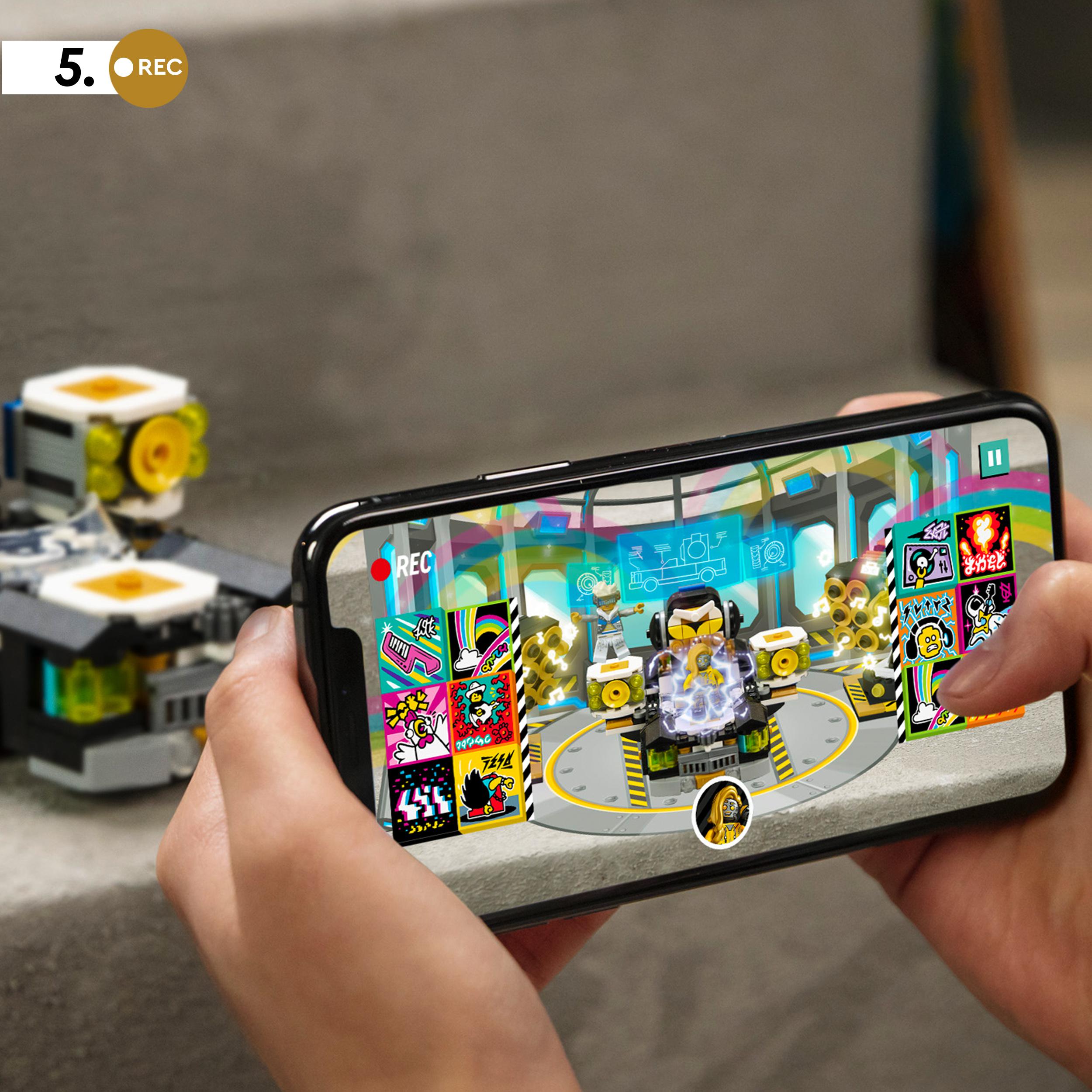 Child using LEGO® VIDIYO app to create a music video with Robo HipHop Car set 43112.