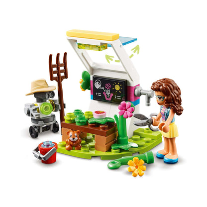 LEGO® Friends Olivia's Flower Garden Play Set 41425 featuring a greenhouse, flowers, and a character with gardening tools.