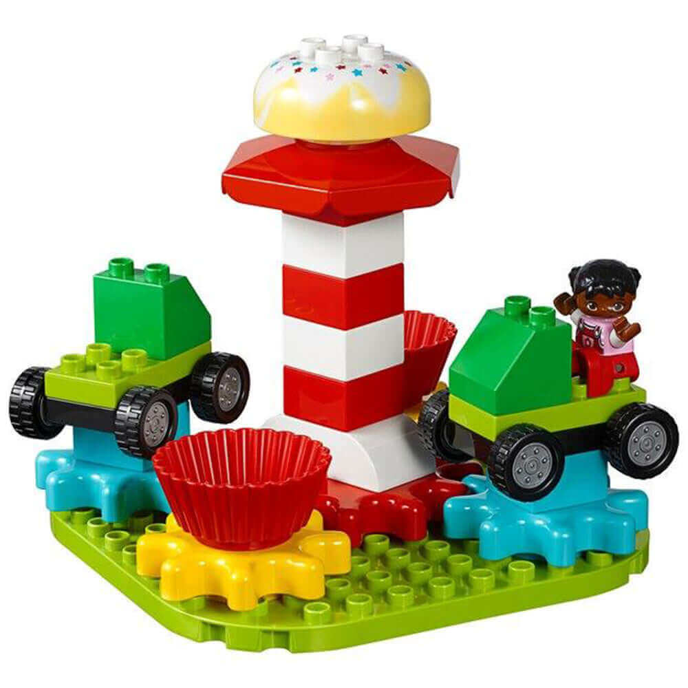LEGO® Education STEAM Park 45024 with colorful rides, vehicles, and a figure, promoting creative play in STEAM learning.
