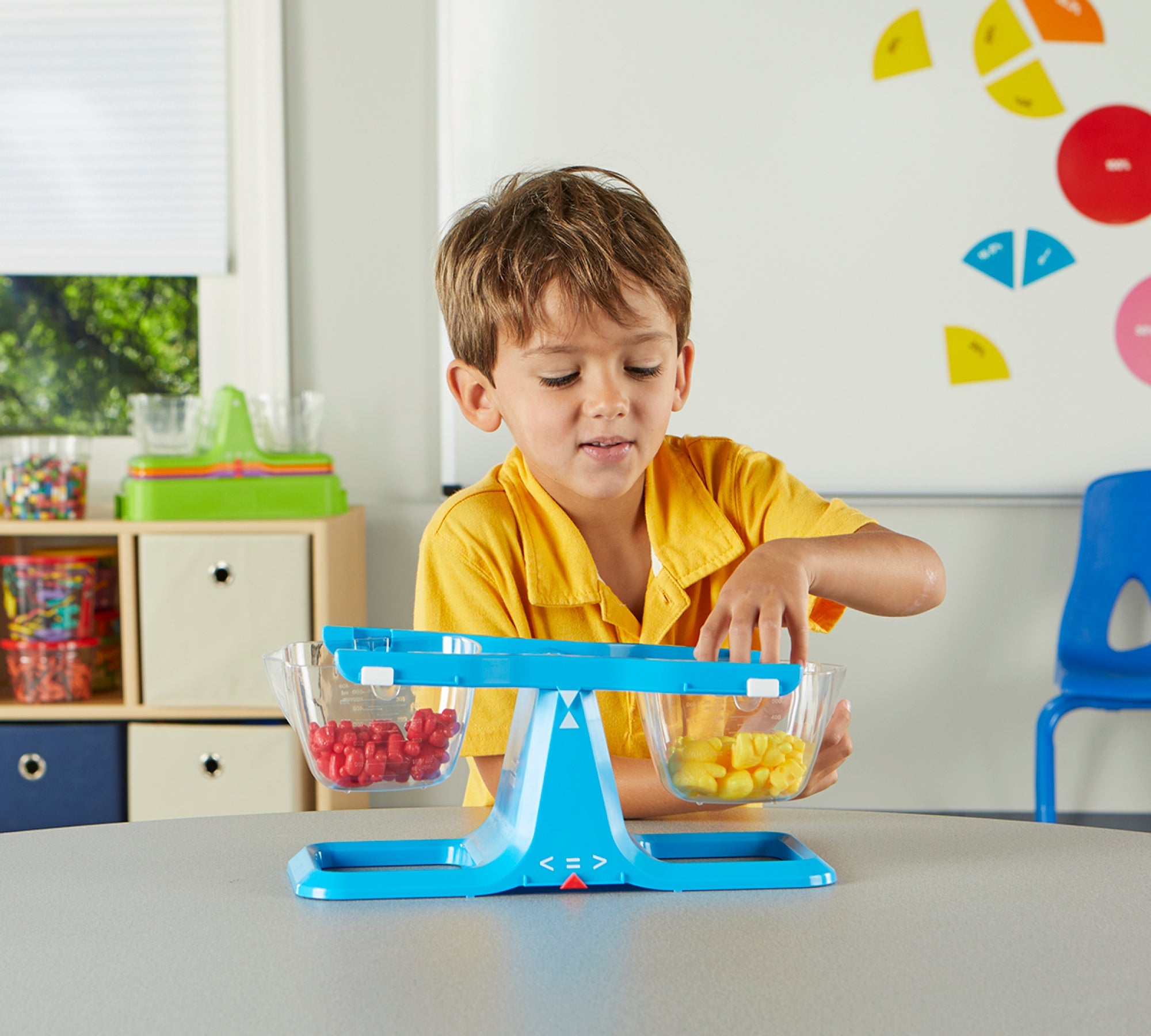 Child playing with Nestable Buckets
