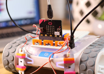Close-up of Sphero RVR with littleBits Topper Kit, showcasing connection wires and electronic components for invention building.