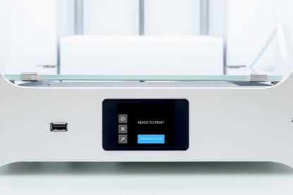 Close-up of Ultimaker 2+ Connect 3D printer control panel displaying 'READY TO PRINT' message.