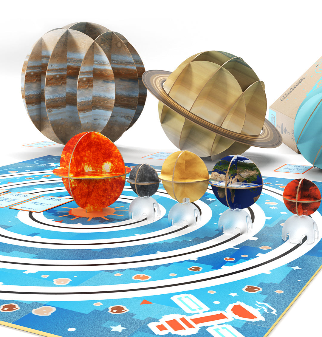 Colorful 3D models of planets and teaching materials from OzoGoes to the Solar System STEAM kit.