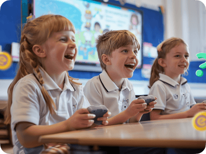 Three smiling schoolchildren joyfully engaged in a gamified educational activity with handheld controllers.