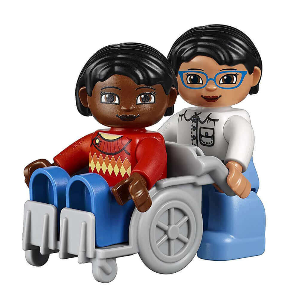 Two LEGO DUPLO figures, one in a wheelchair, representing community diversity and inclusion for preschool learning.
