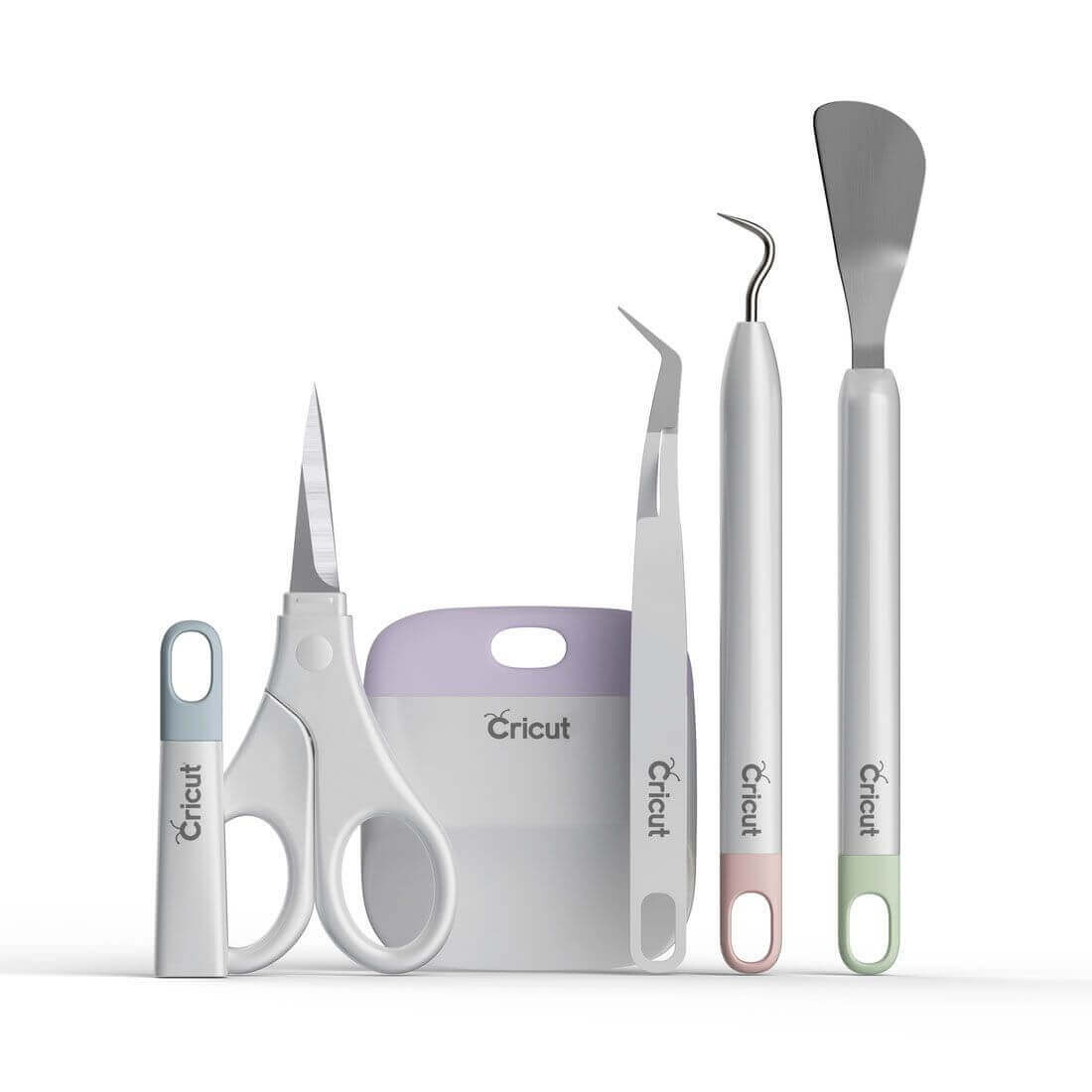 Cricut Basic Tool Set featuring essential crafting tools for vinyl and paper projects in stylish colors.