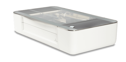 Glowforge Plus laser cutter, ideal for engraving and crafting, showcasing sleek design and advanced technology.