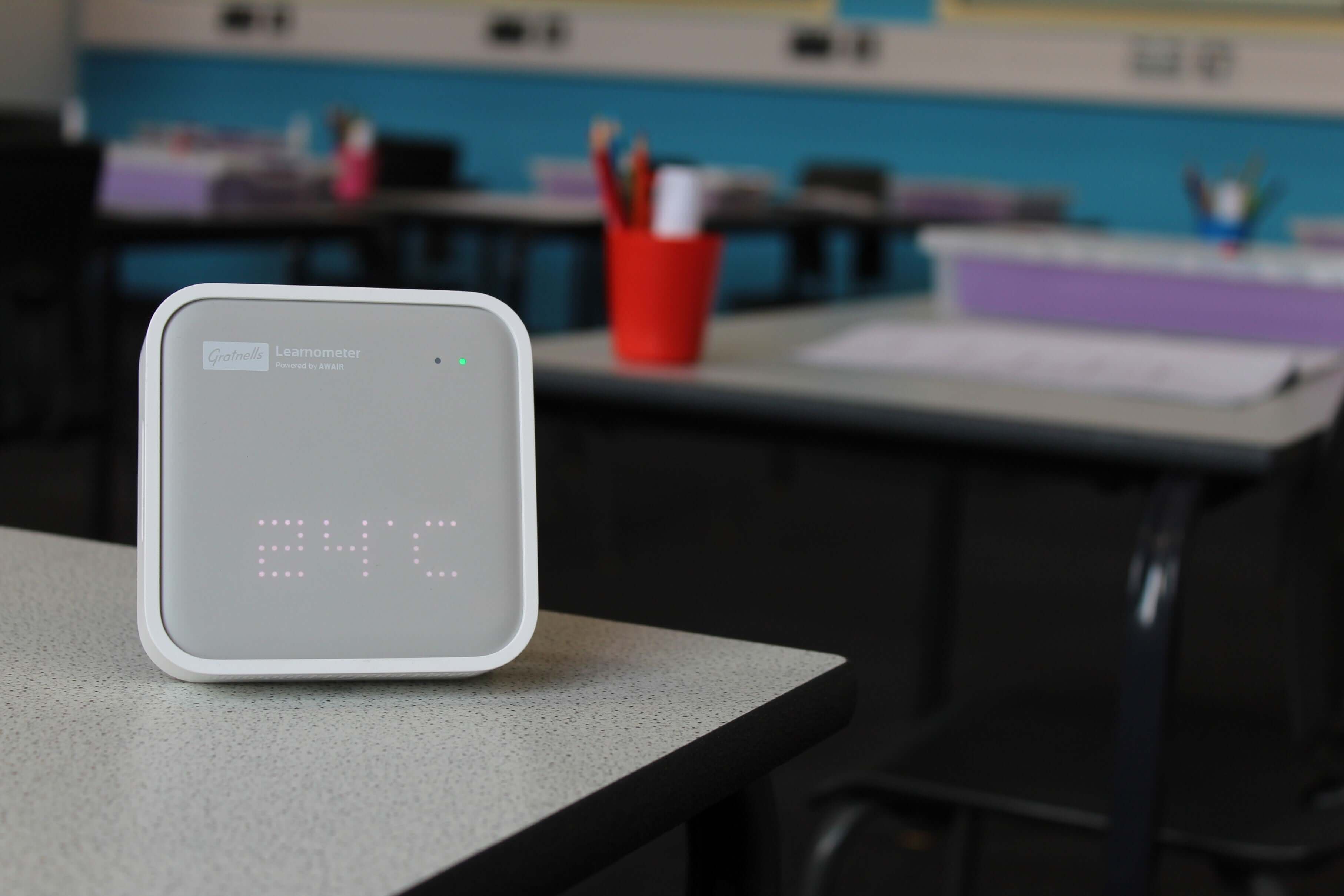 Gratnells Learnometer device displaying temperature in a classroom setting, designed for educational optimization.