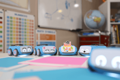 Sphero indi™ Student Kit robots on a table, fostering STEAM learning with playful designs and bright colors.