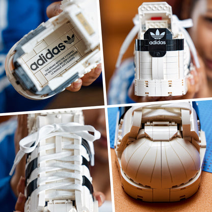 Close-up of LEGO® adidas Originals Superstar trainer with detailed laces and iconic logo design, showcasing craftsmanship.