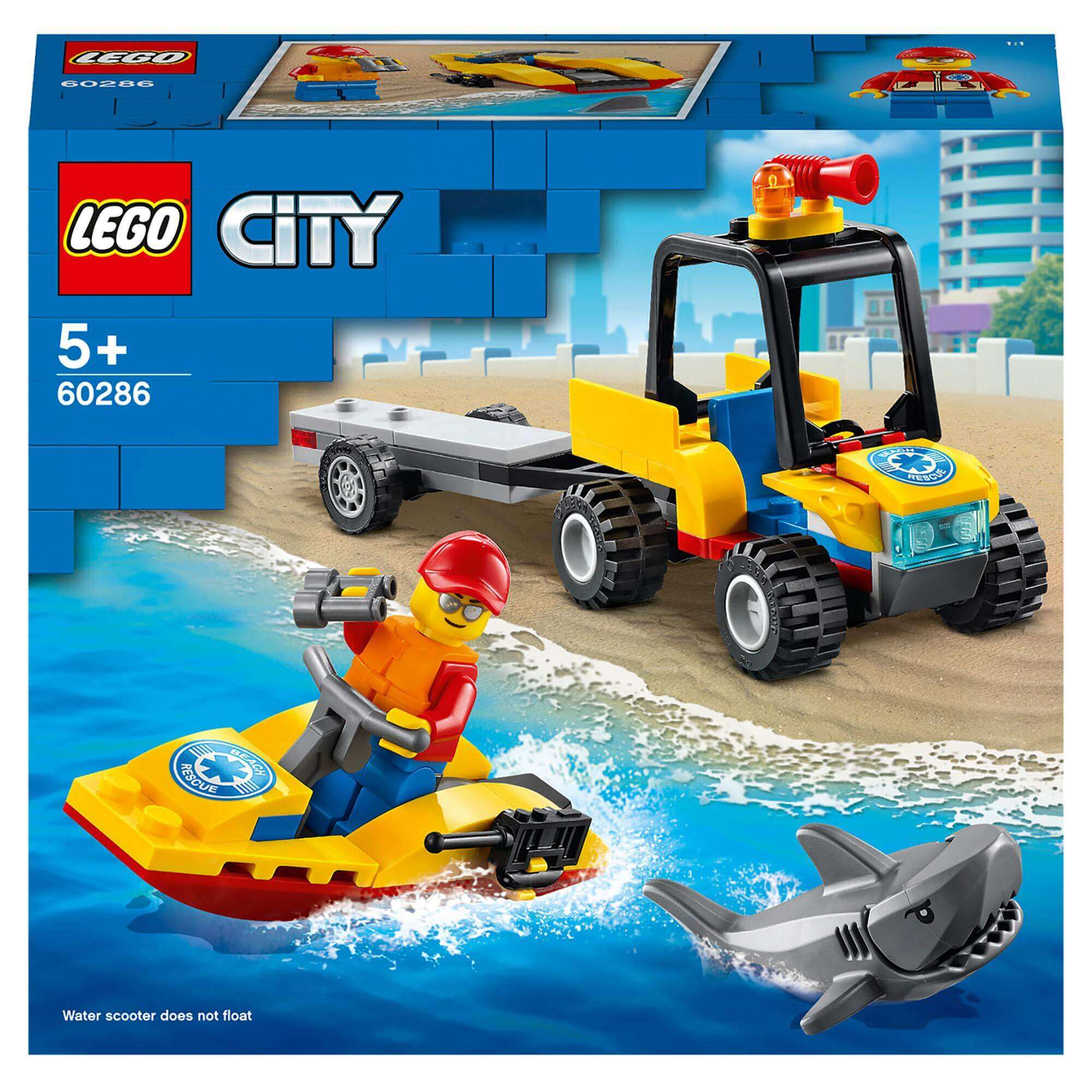 LEGO® City 60286 Beach Rescue ATV with trailer, water scooter, lifeguard minifigure, and shark toy on sandy beach.