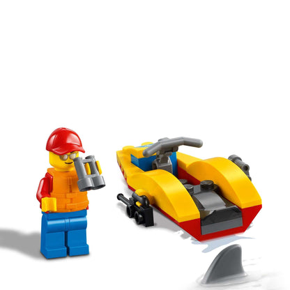 LEGO® City Beach Rescue ATV playset with lifeguard minifigure and water scooter, perfect for imaginative play.