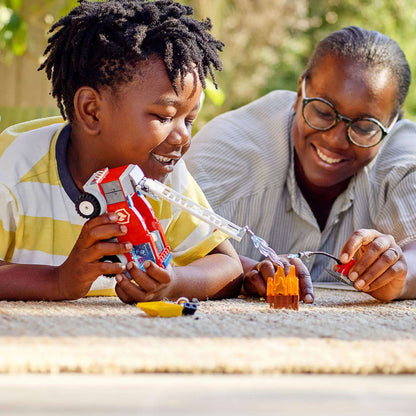 Children playing with LEGO® City Fire Ladder Truck Toy 60280, engaging in imaginative fire rescue scenarios.