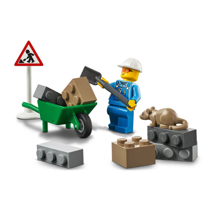 LEGO® City roadwork toy featuring a construction worker, wheelbarrow, and bricks, ideal for kids aged 4+.