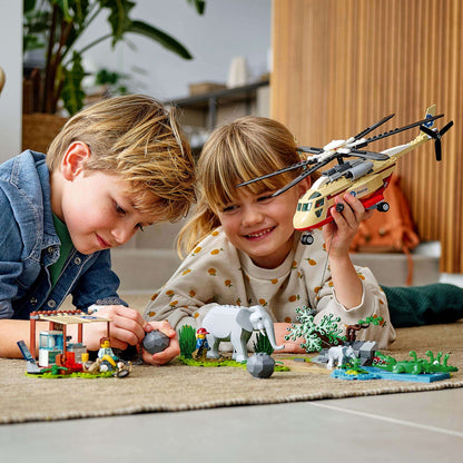 Kids enjoying the LEGO® City Wildlife Rescue Operation Vet Set 60302 with animals and a helicopter for fun roleplay.
