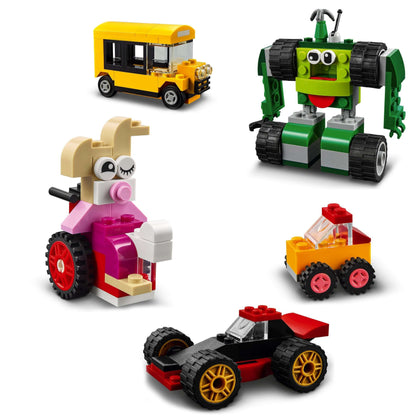 LEGO® Classic Bricks and Wheels Building Set displaying creative vehicles, including a bus, robot, and colorful cars.