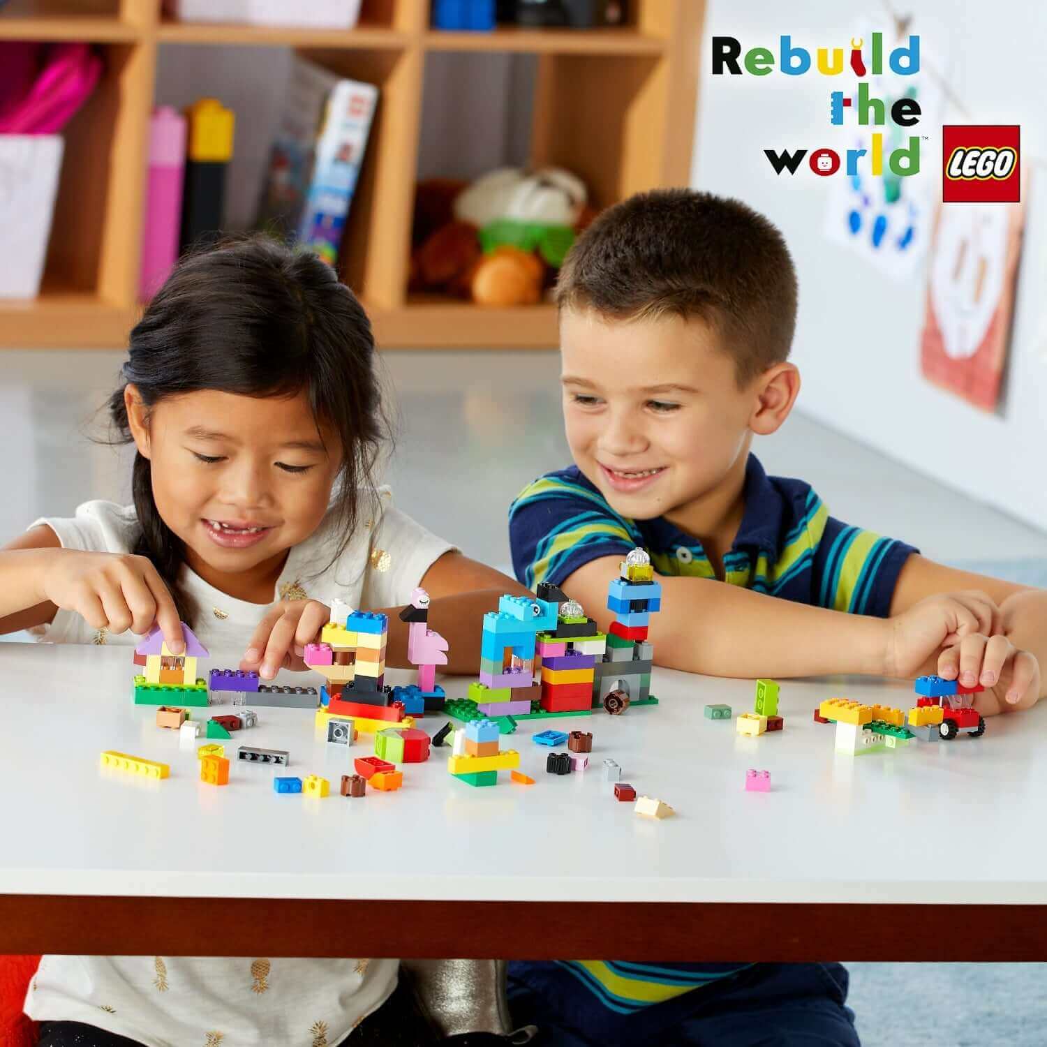 Kids playing with colorful LEGO® bricks in a creative building activity, promoting imagination and fun.