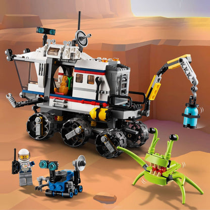 LEGO® Creator 3in1 Space Rover Explorer Set 31107 with rover, mini-figures, and alien creature in a space landscape.