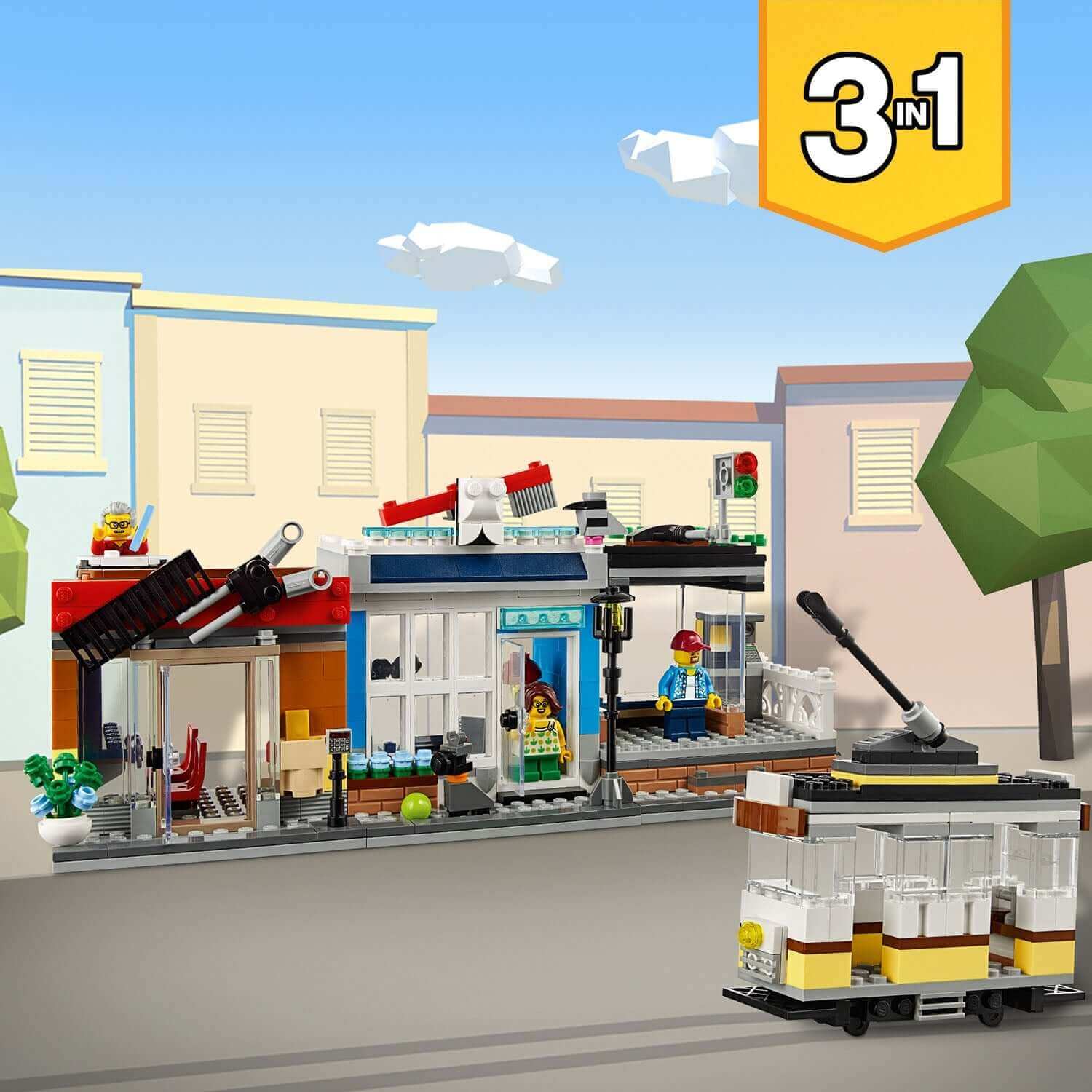LEGO® Creator 3in1 Townhouse Pet Shop & Café 31097 featuring detailed building and tram.