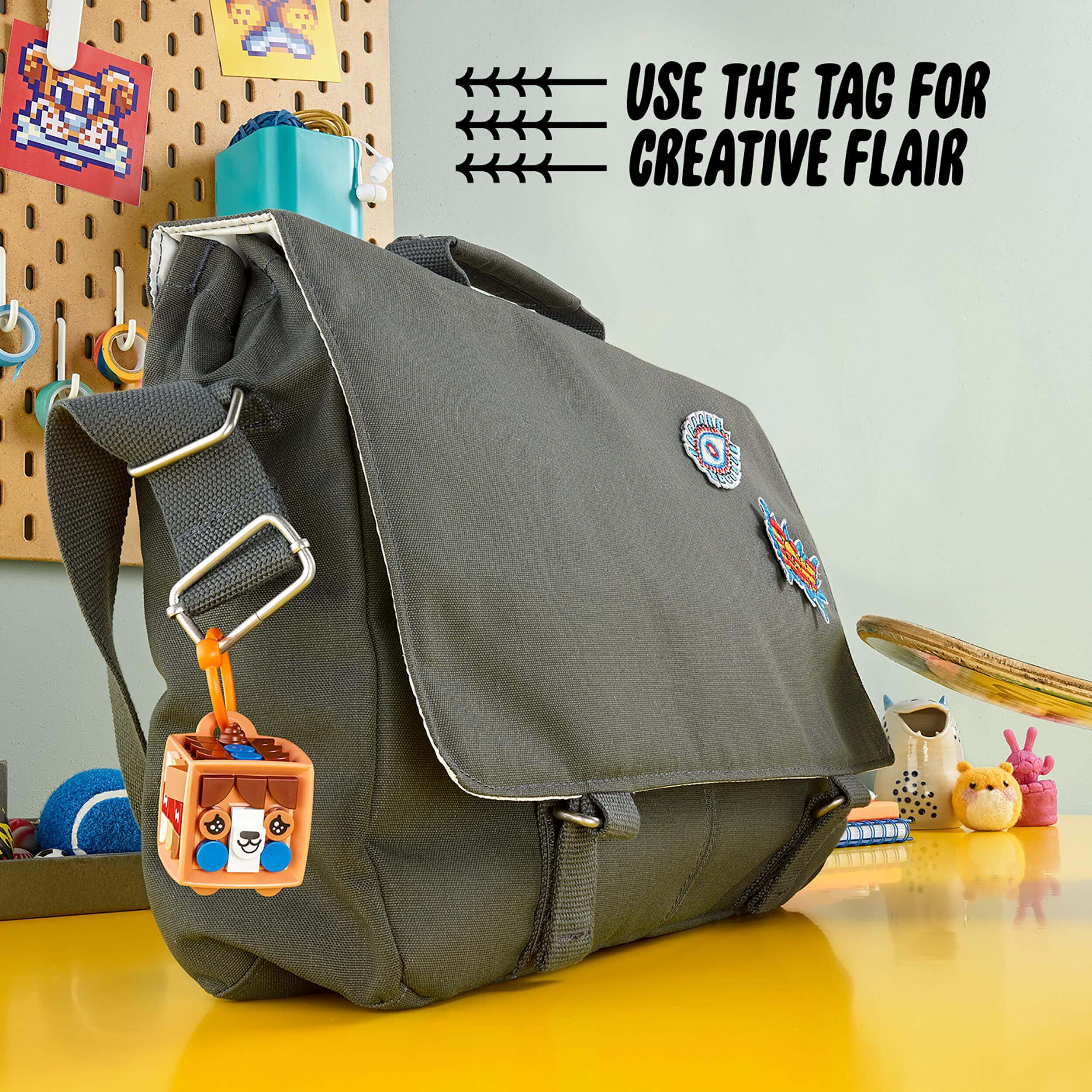 LEGO® DOTS Bag Tag Dog Accessories Craft Set 41927 on a backpack, showcasing creative kids' arts and crafts.
