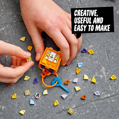 LEGO® DOTS Bag Tag Leopard Crafts Set for Kids featuring colorful tiles and child assembling the creative bag tag.