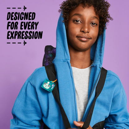Child wearing blue hoodie with customized LEGO DOTS bag tag on backpack, showcasing creative expression.