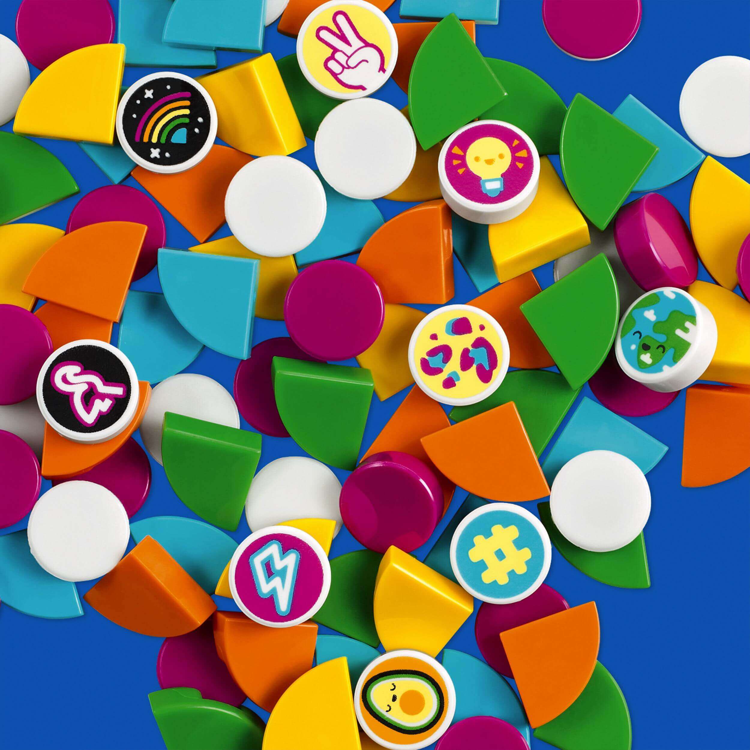 Colorful LEGO® DOTS Extra DOTS – Series 5 tiles, featuring unique designs and vibrant shapes for creative crafting.