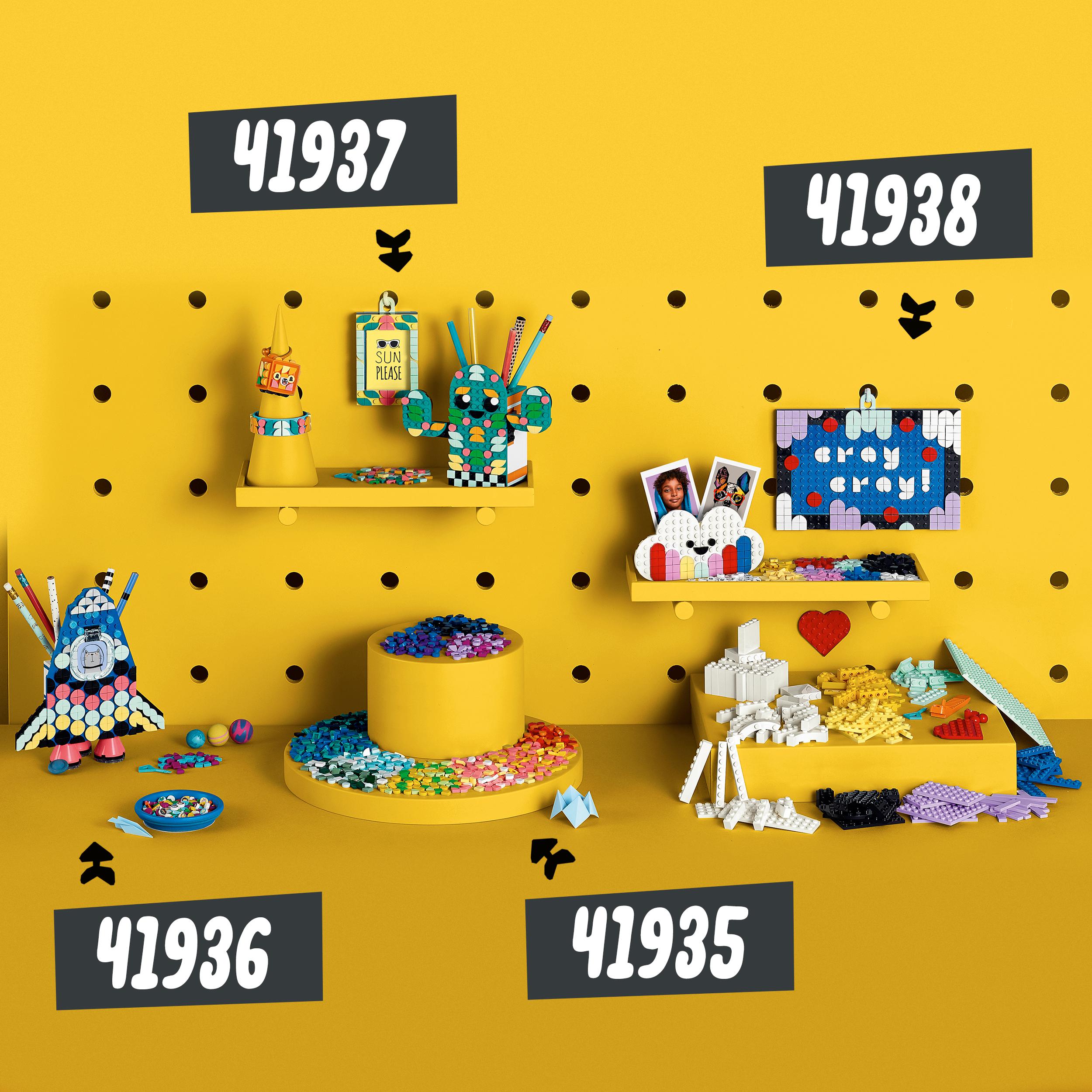 Colorful LEGO® DOTS craft sets 41936, 41937, and 41938 displayed on yellow background, showcasing creative pencil holder and accessories.