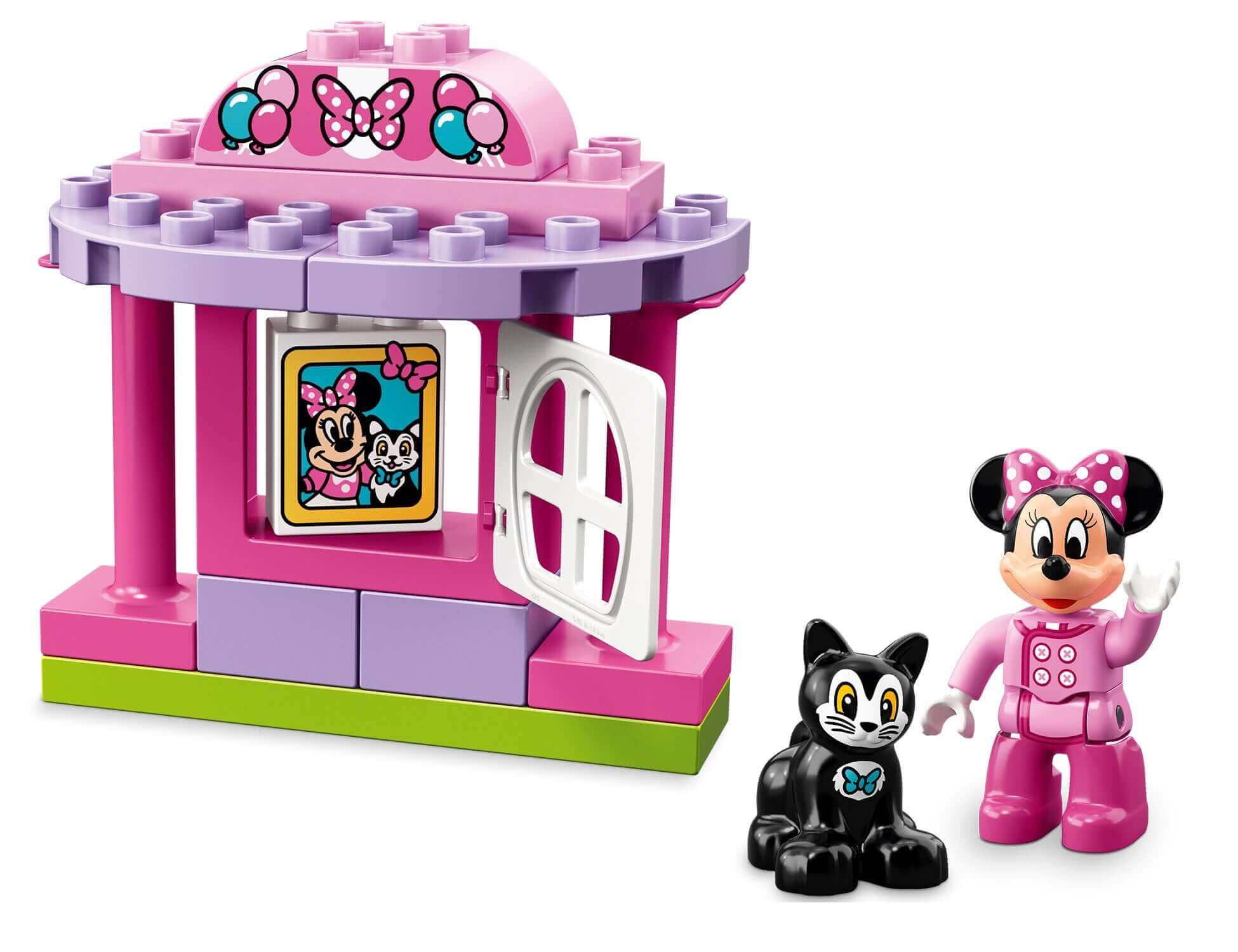 LEGO® DUPLO Disney Minnie Birthday Party set with Minnie figure and cat in front of colorful party venue.