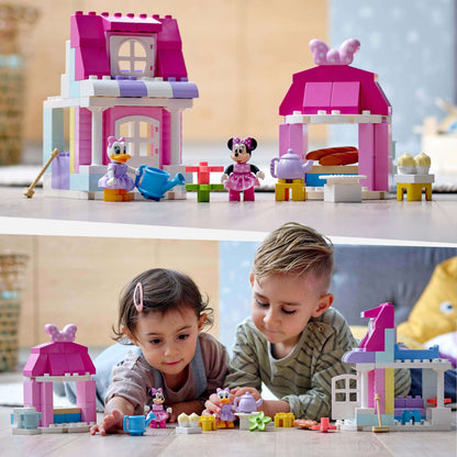 Children playing with LEGO® DUPLO Disney Minnie’s House and Café set, featuring Minnie and Donald characters.