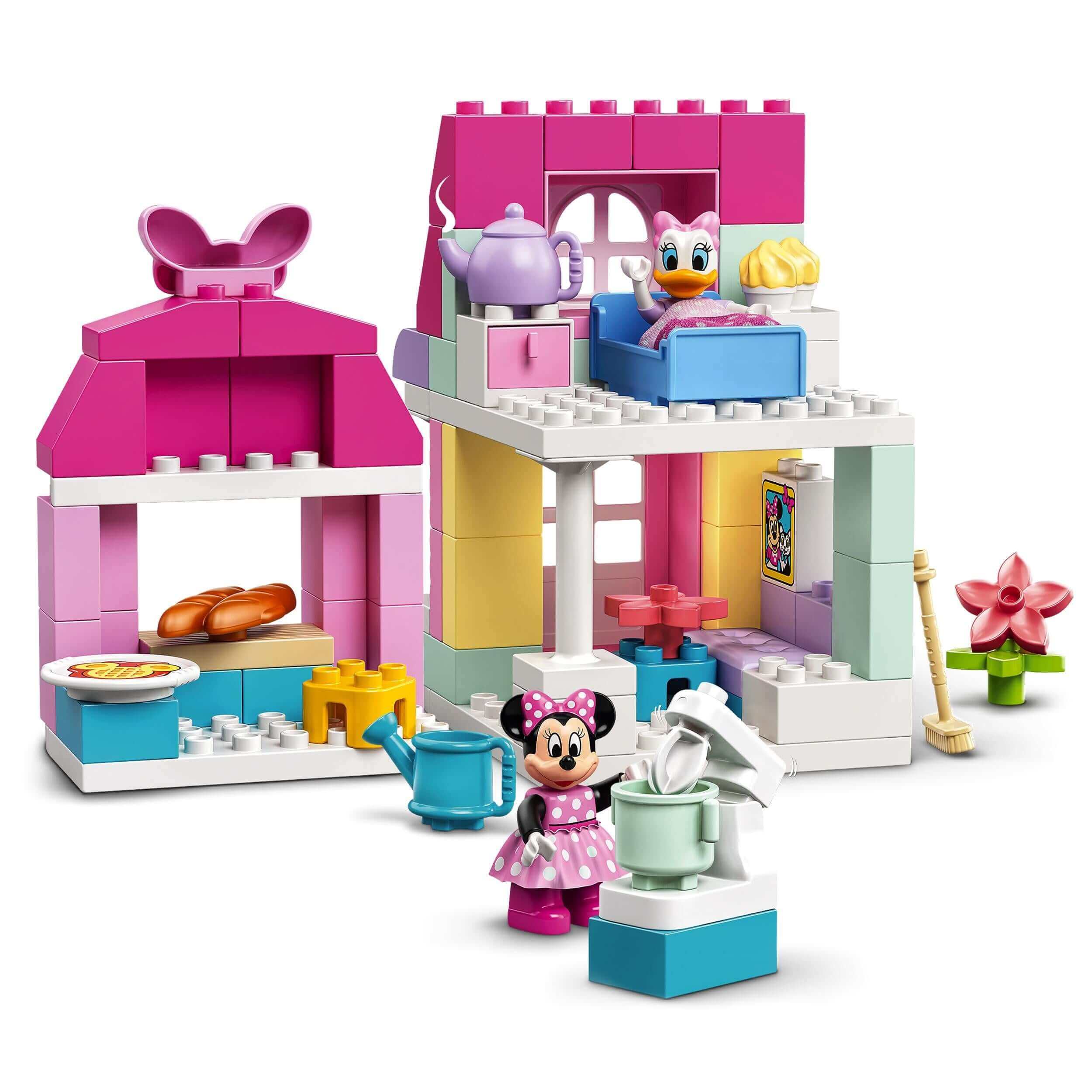 LEGO DUPLO Disney Minnie’s House and Café Set 10942 featuring Minnie Mouse and Daisy Duck in colorful playhouse.