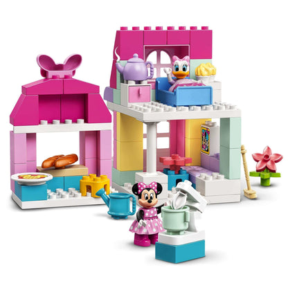 LEGO DUPLO Disney Minnie’s House and Café Set 10942 featuring Minnie Mouse and Daisy Duck in colorful playhouse.