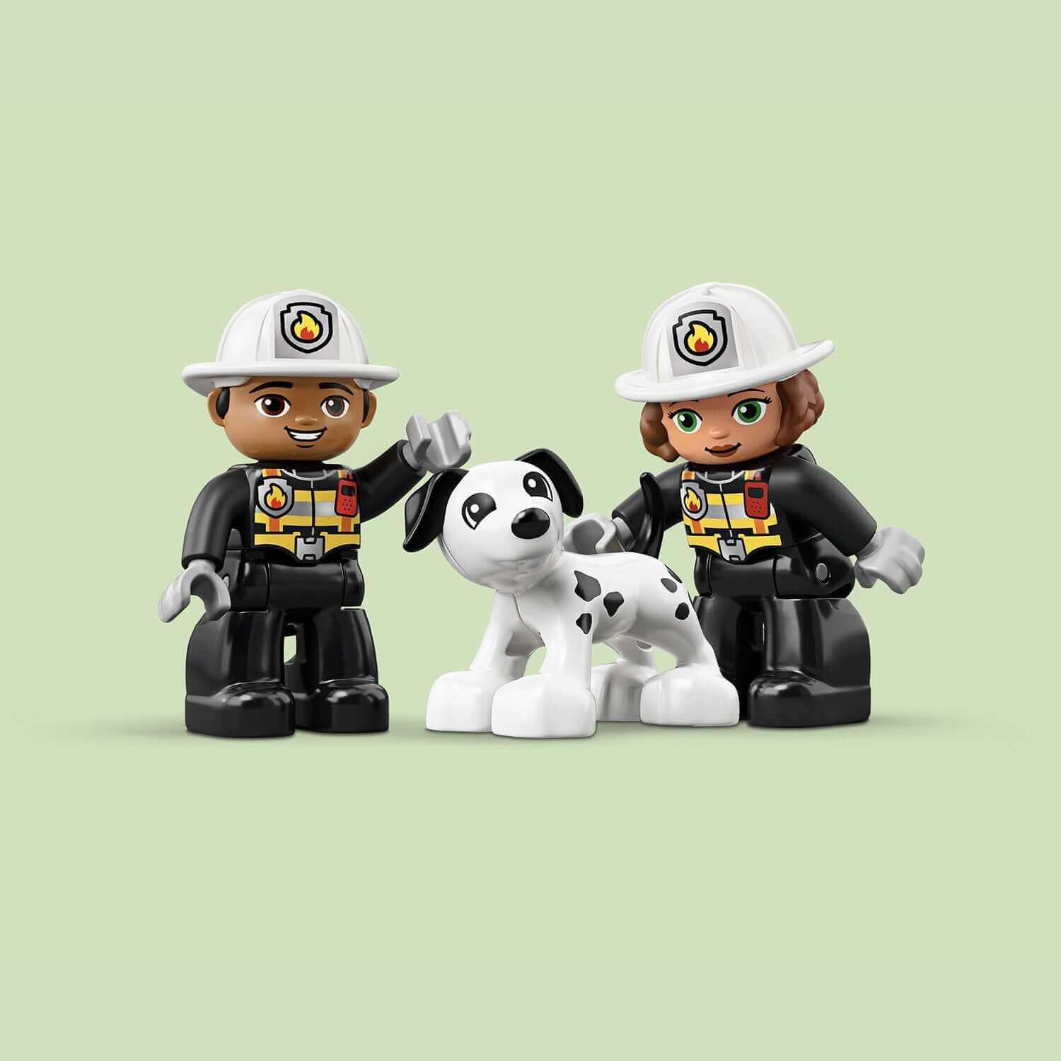 LEGO DUPLO fire station set featuring two firefighters and a playful dog, perfect for imaginative play.
